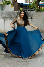 Load image into Gallery viewer, Alluring Blue Heavy Georgette Self Design Gown For Women