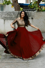 Load image into Gallery viewer, Alluring Maroon Heavy Georgette Self Design Gown For Women
