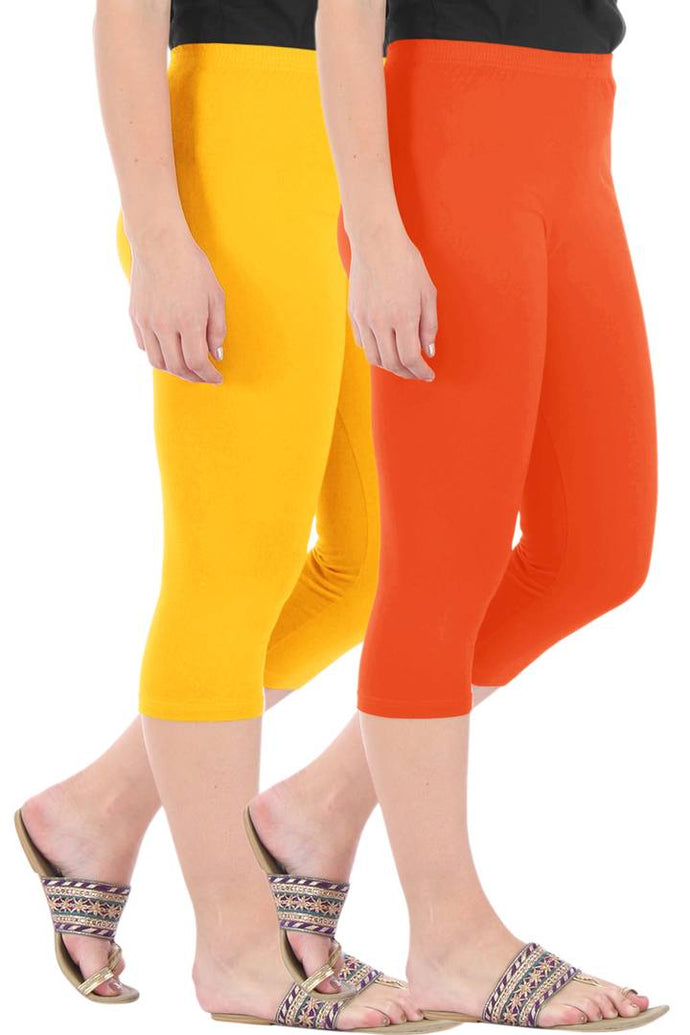 Stylish Cotton Blend Yellow & Orange Solid Skinny Fit 3/4 Capris Leggings for Women ( Pack Of 2 )
