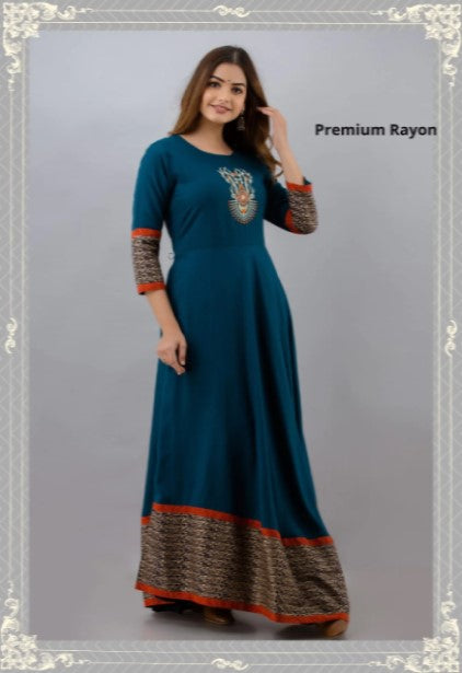 Elevate your style with our Long Gown Kurti in Navy Blue premium Rayon 1011. As an industry expert, I can confidently say this charming dress offers both comfort and sophistication with its premium fabric and elegant design. Perfect for any occasion, this dress will make you stand out and feel confident.